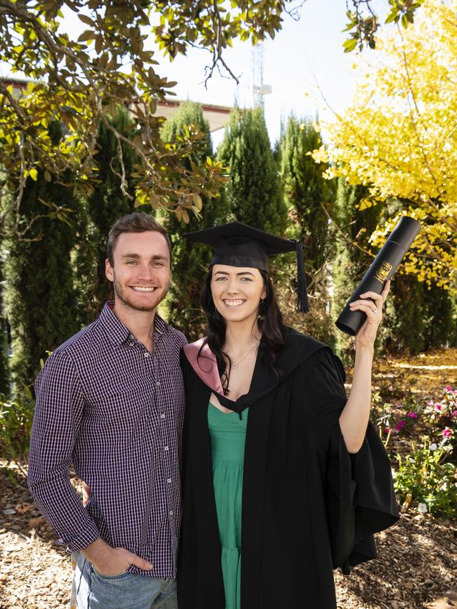 Bachelor of Education (Early Childhood) graduate Jenna Pedler celebrates with Mason Hartog at a UniSQ graduation ceremony at Empire Theatres, Tuesday, June 27, 2023. Picture: Kevin Farmer