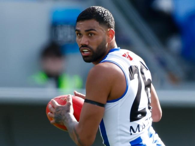 HOBART, AUSTRALIA - AUGUST 26: Tarryn Thomas of the Kangaroos in action during the 2023 AFL Round 24 match between the North Melbourne Kangaroos and the Gold Coast SUNS at Blundstone Arena on August 26, 2023 in Hobart, Australia. (Photo by Dylan Burns/AFL Photos via Getty Images)