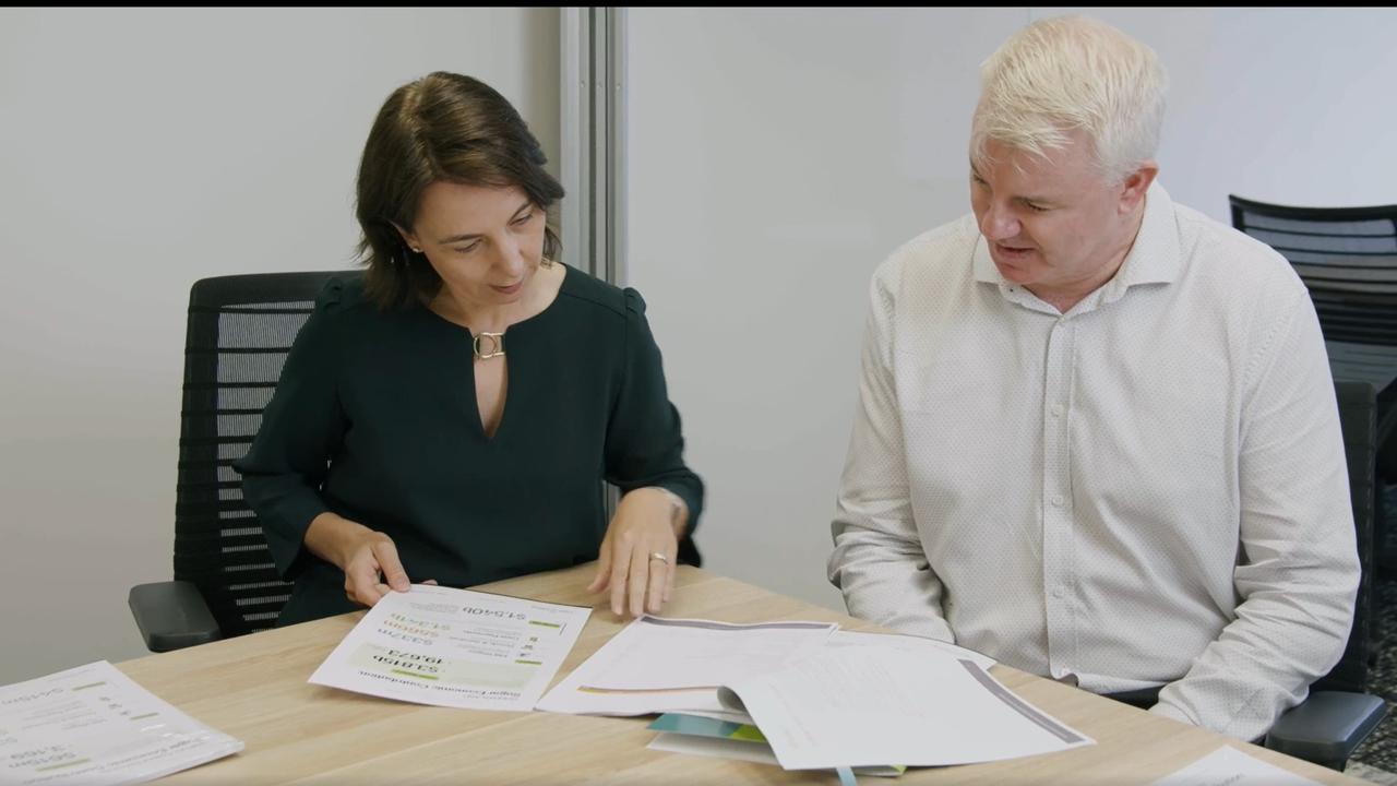 Australian Sugar Milling Council chief executive officer Rachele Sheard reads through the 2020-21 industry report with economics, policy and trade director David Rynne. Picture: Supplied