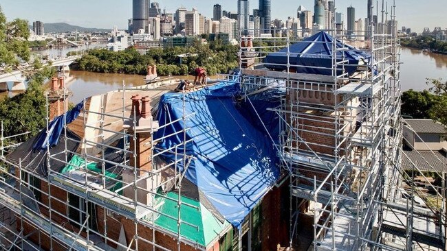 The roof encased in scaffolding.