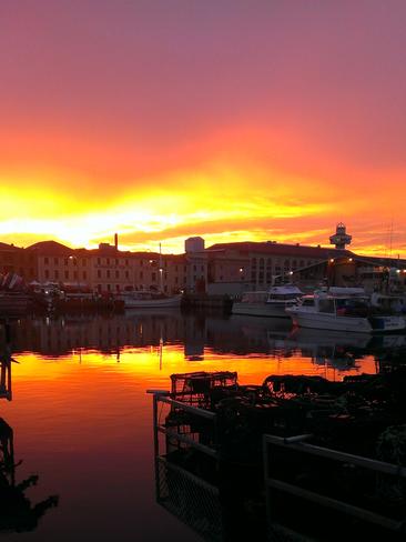 Sunrise over Hobart’s waterfront by Libby Sutherland.