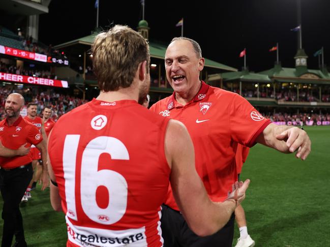 John Longmire celebrates with Campbell after the game. Picture: Getty Images