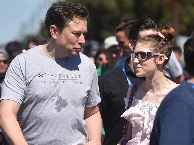 Elon Musk and his former partner, musician Grimes, in 2018. Picture: AFP