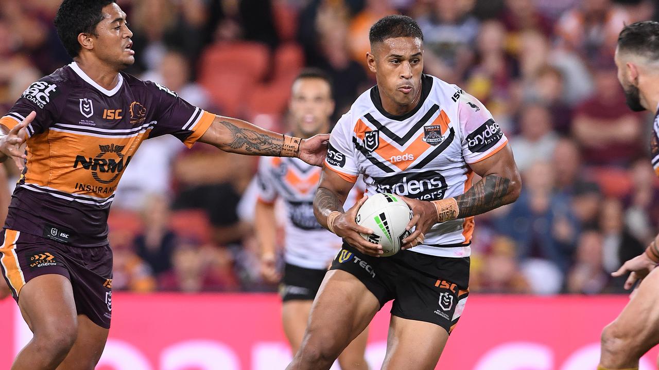 Michael Chee Kam playing against the Broncos