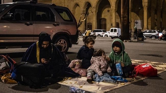 People displaced by announcements of Israeli airstrikes rest on Martyrs Square on November 26 in Beirut, Lebanon. Picture: Ed Ram/Getty Images