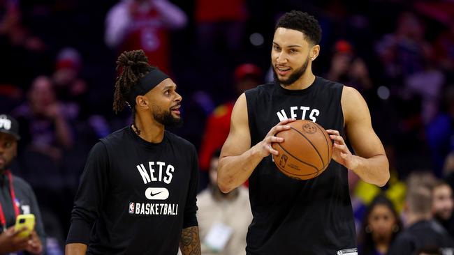 Patty Mills #and Ben Simmons of the Brooklyn Nets. Photo by Elsa/Getty Images