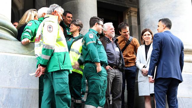 Labor Leader Peter Malinauskas on Parliament House steps on Thursday with health care workers. Picture: Dean Martin