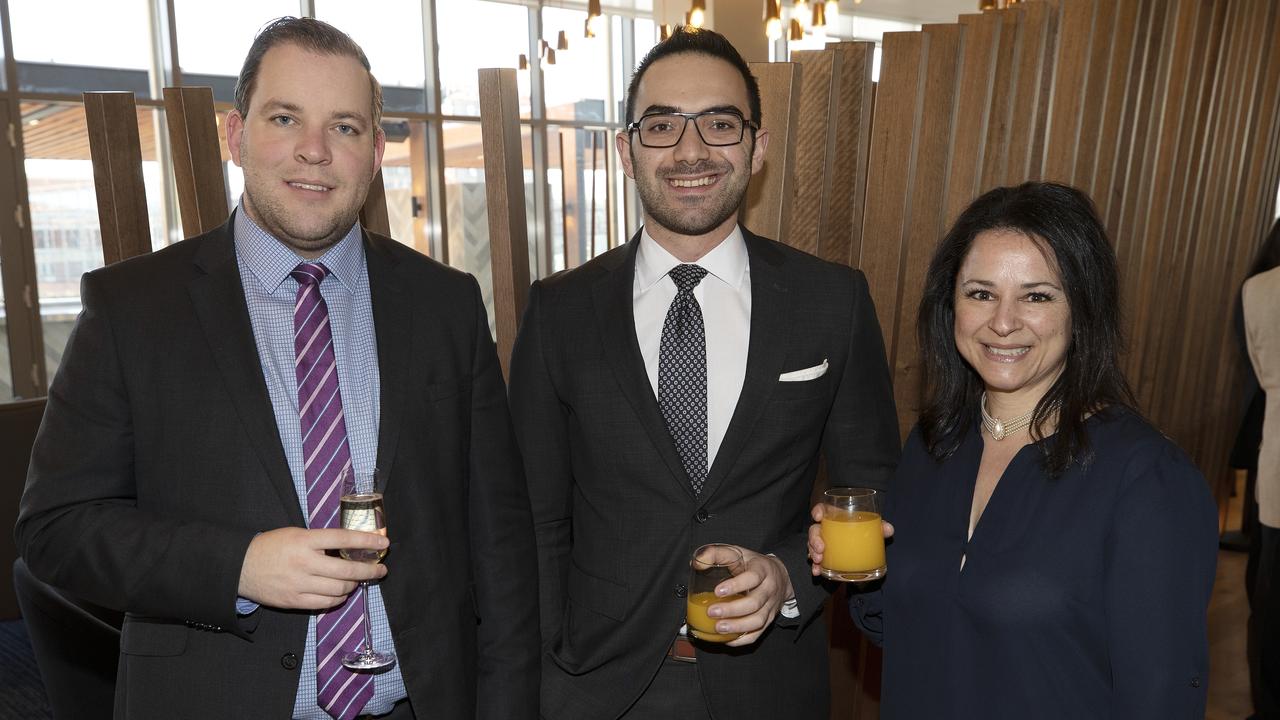 (L-R) Will Coats, Simon Behrakis and Georgie Kalis during the opening of the Crowne Plaza Hotel at Hobart. Picture Chris Kidd