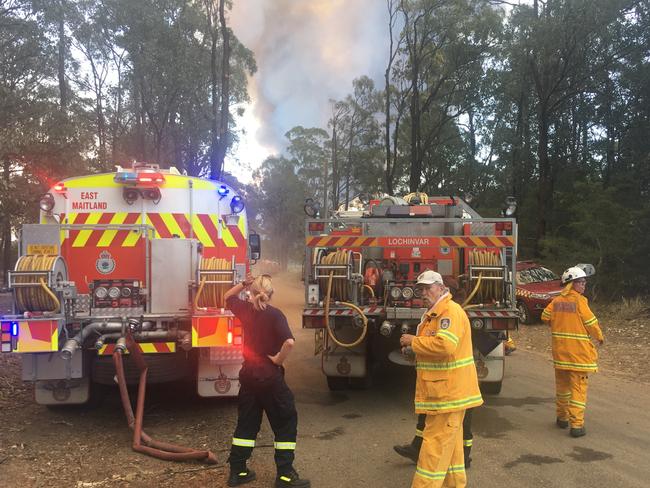 Fire crews at work. Picture: Peter Lorimer