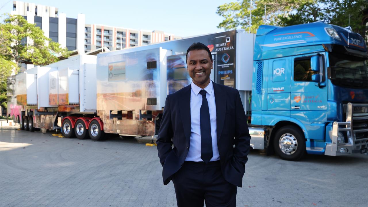 Dr Rolf Gomes stands in front of the revolutionary HEART 5 mobile screening unit. Picture: Heart of Australia