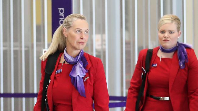 Virgin staff at Brisbane Airport after the company axed 3000 jobs. Photographer: Liam Kidston