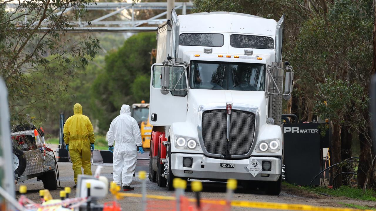 Workers dealing with an avian influenza bird flu outbreak at Meredith. Picture: Alison Wynd