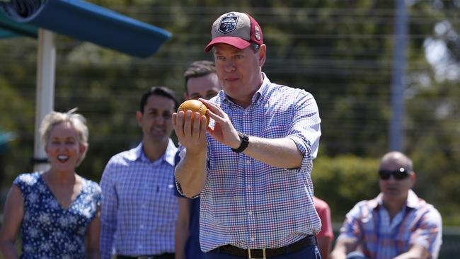 Queensland Opposition Leader Tim Nicholls plays bowls during a visit to Musgrave Hill Bowls Club. Picture: AAP Image/Regi Varghese