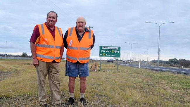 Warwick and District Road Safety Group members Andrew Gale and Graham Buchner are hoping the completion of a State Government business case could make an upgrade to the Eight Mile intersection a reality. Picture: Jayden Brown