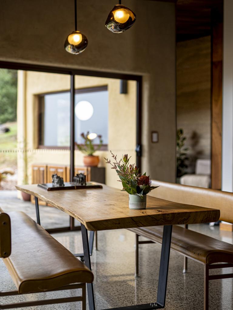 The dining table, crafted from timber salvaged on the Huon Valley property. Picture: Brad Harris