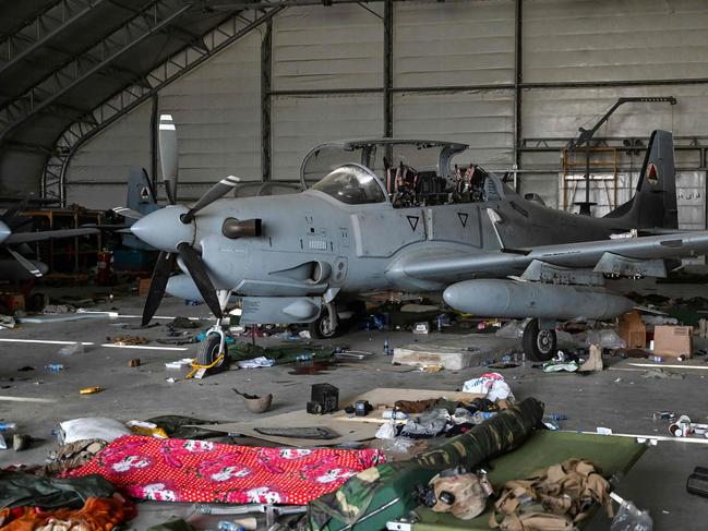 A Afghan Air Force A-29 attack aircraft is pictured inside a hangar at the airport in Kabul on August 31, 2021, after the US has pulled all its troops out of the country to end a brutal 20-year war — one that started and ended with the hardline Islamist in power. Picture: AFP