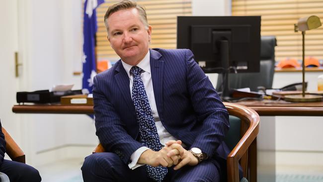 Opposition treasury spokesman Chris Bowen talks with the costings panel in his office. Picture: Rohan Thomson/AAP