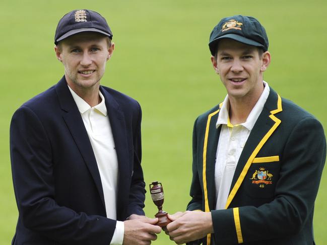 England captain Joe Root, left, and Australia's captain Tim Paine pose with the Ashes urn before the first Ashes Test match between England and Australia at Edgbaston in Birmingham, England, Wednesday July 31, 2019. The first Test match starts Thursday Aug. 1 at Edgbaston. (AP Photo/Rui Vieira)