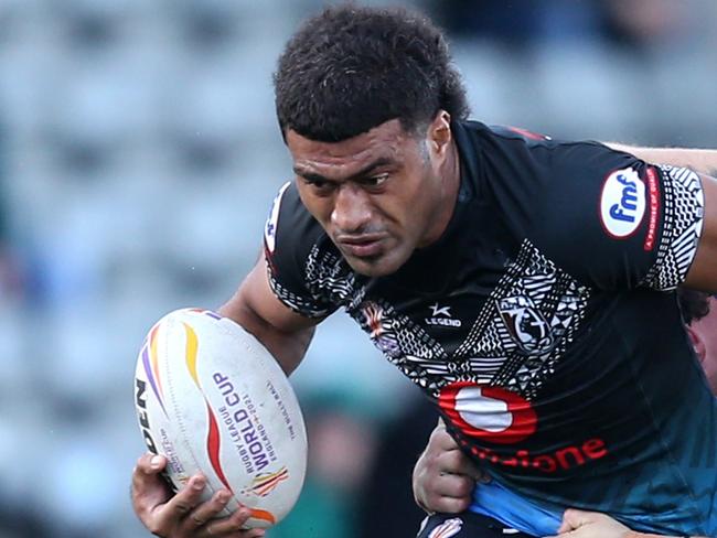 NEWCASTLE UPON TYNE, ENGLAND - OCTOBER 22: Taniela Sadrugu of Fiji breaks through a tackle from Jack Colovatti of Italy during Rugby League World Cup 2021 Pool B match between Fiji and Italy at Kingston Park on October 22, 2022 in Newcastle upon Tyne, England. (Photo by Ashley Allen/Getty Images)