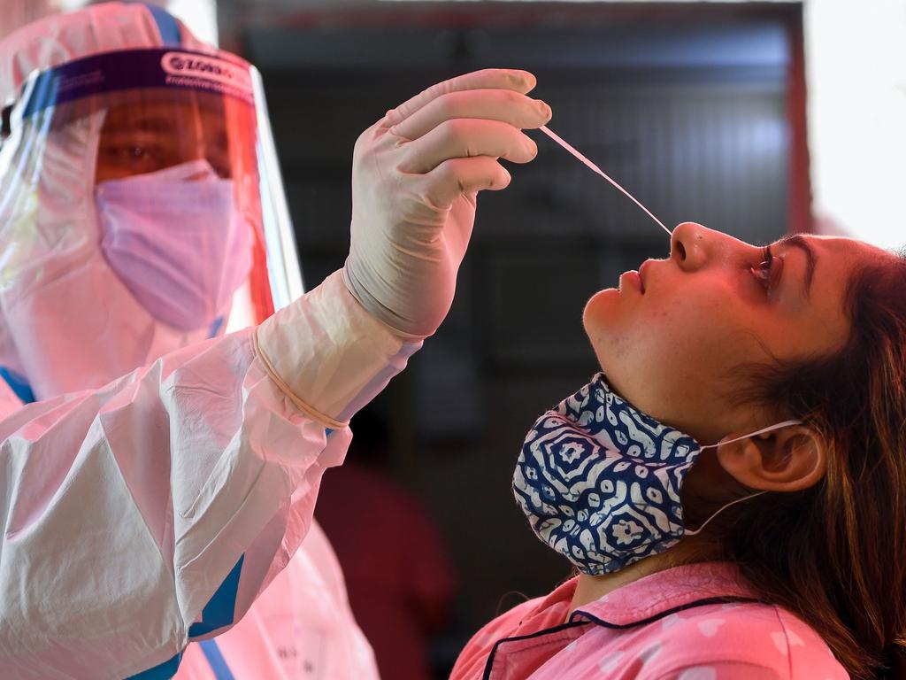 While normally free, PCR tests for travellers must be done privately and paid for. Picture: Prakash Singh/AFP