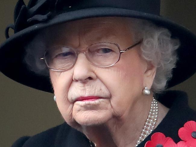 LONDON, ENGLAND - NOVEMBER 08: Queen Elizabeth II looks on during the Service of Remembrance at the Cenotaph at The Cenotaph on November 08, 2020 in London, England. Remembrance Sunday services are still able to go ahead despite the covid-19 measures in place across the various nations of the UK. Each country has issued guidelines to ensure the safety of those taking part. (Photo by Chris Jackson/Getty Images)