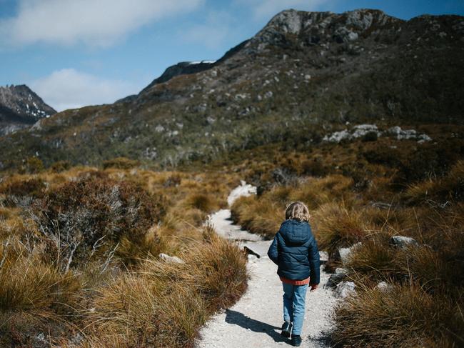 One of Jodi Wilson’s children explores the Tasmanian wilderness. Image from Practising Simplicity by Jodi Wilson.