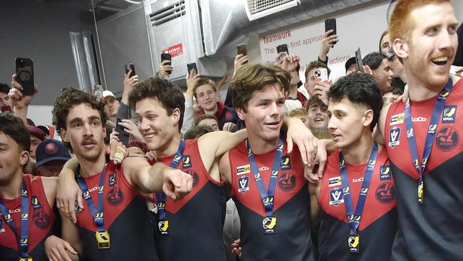 Mt Eliza celebrate in the rooms after their win. Picture: Andrew Batsch