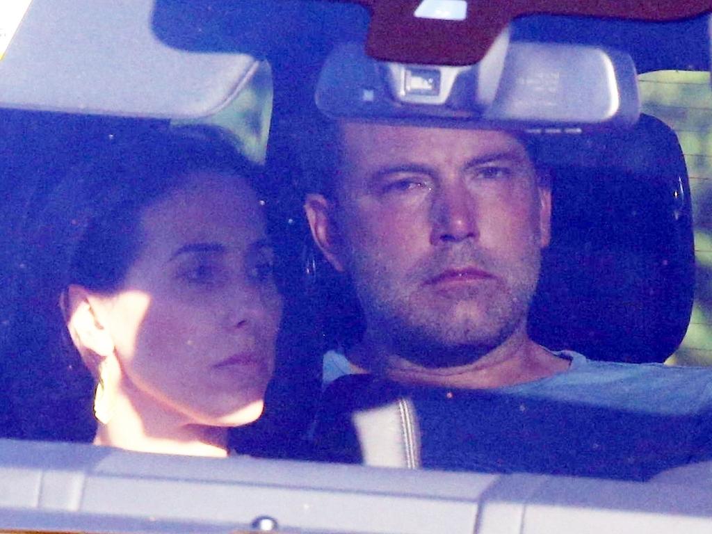 Affleck is pictured in the rear seat of Garner’s car. Picture: BackGrid