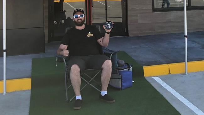 Dave Wilson is camping outside Carl's Jr Eagleby in a bid to try to win free burgers for one year.