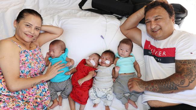 Mater miracle Quads , Eddie, Anna, Archie and Louis with parents Yogesh and Aruna Joshi. Pic: Annette Dew