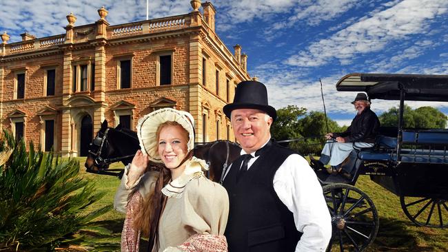 National Trust SA CEO Dr Darren Peacock, with Morgan Mudge, 18, of Burra, and Rob McDonald from Barrosa Carriages in front of historic Martindale Hall. Picture: Tom Huntley