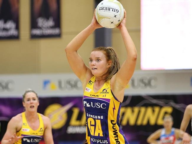 RETURNING:v Lighting attacker Steph Wood passes the ball during the Super Netball Major Semi Final match last year. Photo: Jono Searle