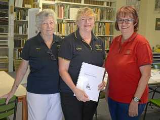 HISTORY BUFFS: Marion Hall, Chris Wright and Linda Marshall at the CQ Family History Association Hall. Picture: Jann Houley