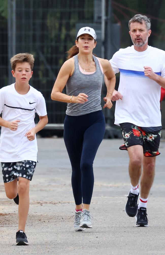 Crown Princess Mary and Crown Prince Frederick of Denmark and their son Prince Vincent out for a morning jog in Sydney. Pictures: Matrix Pictures