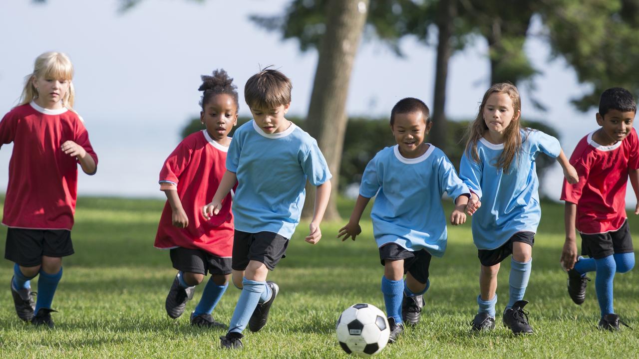 Kids playing soccer. Exercise is believed to be an important way to prevent obesity.