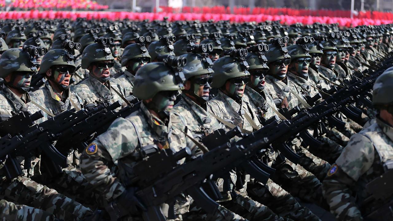 North Korean soldiers during a military parade. Sheer force is part of what keeps the populace in line. Pic: AFP