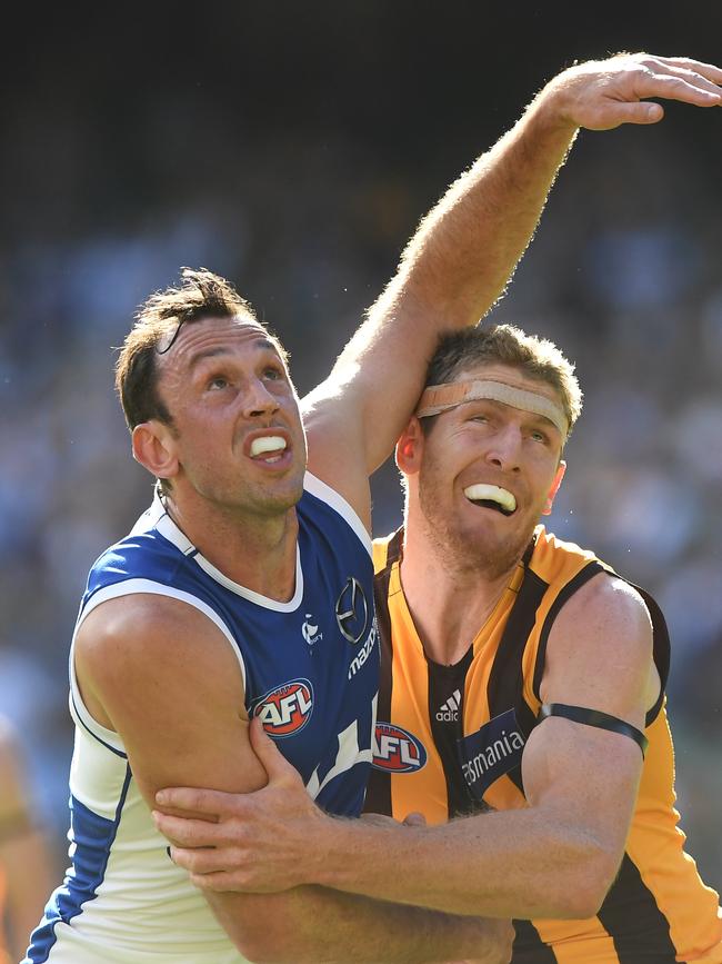 A little older, a little wiser, a few more premierships, but McEvoy and Goldstein are still battling, albeit with the latter in a Hawks’ guernsey. Picture: AAP