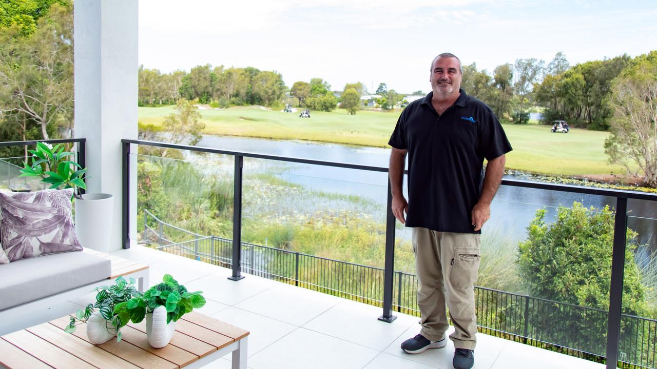 Mater Prize Home winner Aaron Stewart at his new dream house back onto a golf course at Bribie Island