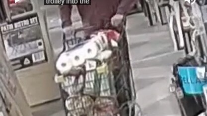 People stealing a trolley full of food from Drakes Wayville. Picture: Drakes