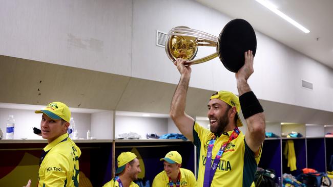 AHMEDABAD, INDIA - NOVEMBER 19: Glenn Maxwell of Australia poses with the ICC Men's Cricket World Cup Trophy following the ICC Men's Cricket World Cup India 2023 Final between India and Australia at Narendra Modi Stadium on November 19, 2023 in Ahmedabad, India. (Photo by Robert Cianflone/Getty Images)