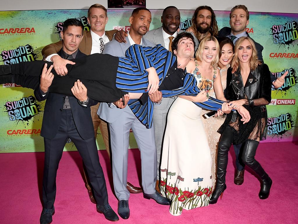 Jay Hernandez, Joel Kinnaman, Will Smith, Adewale Akinnuoye-Agbaje, Ezra Miller, Jason Momoa, Margot Robbie, Karen Fukuhara, Cara Delevingne and Jai Courtney attend the Suicide Squad European Premiere sponsored by Carrera on August 3, 2016 in London, England. Picture: Getty