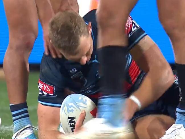 Tom Trbojevic was knocked out of State of Origin I after a collision with Tom Flegler. Credit: Nine screenshot.