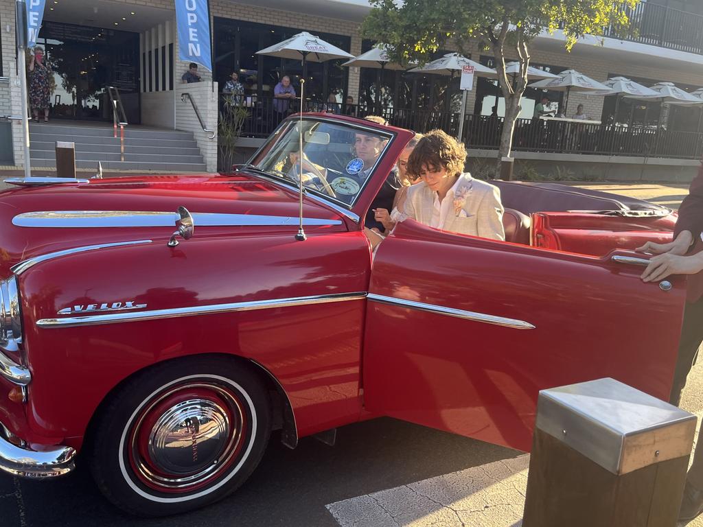 The students of Fraser Coast Anglican College arrive at their formal.