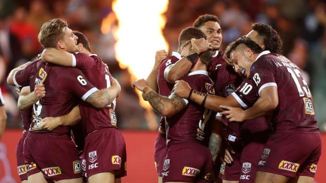 maroons celebrate a try in Adelaide.