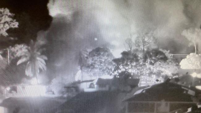 Houses burn during riots in Aurukun on January 1.
