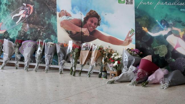 Flowers, beer and cigarettes left by friends of Jack Beasley outside the Surfers Paradise IGA in the days after the teen’s death. Photographer: Liam Kidston.