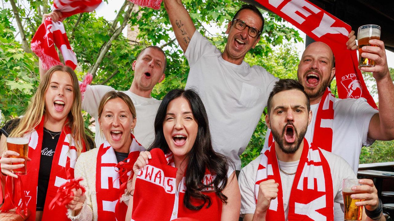 Swans fans at the Clock Hotel getting excited for the AFL grand Final this weekend. Charlotte Bradford, Catriona Piper, Nick Cerrone, Deanna Pserras, Raf Magalhaes, Bradley Calvin and Daniel Noble. Picture: Justin Lloyd.