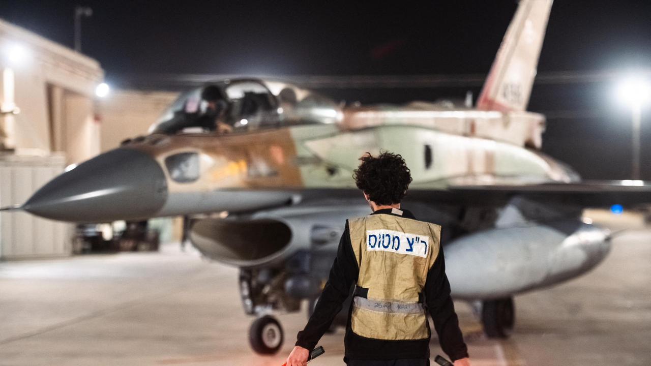 An Israeli fighter jet leaves a hangar at an undisclosed location in Israel. Picture: AFP / Handout / Israeli Army