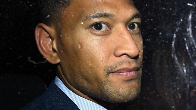 Wallabies star Israel Folau leaves a Code of Conduct hearing in Sydney, Tuesday, May 7, 2019. Folau appeared before a code of conduct hearing to fight Rugby Australia's decision to terminate his contract after he posted in mid-April on social media that gay people, along with other 'sinners' will face damnation unless they repent. (AAP Image/Joel Carrett) NO ARCHIVING