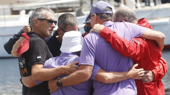 Sailors from Bowline and Flying Fish Arctos after wreaths were laid in tribute at Constitution Dock Hobart following the loss of Nick Smith and Roy Quaden. Picture: Nikki Davis-Jones